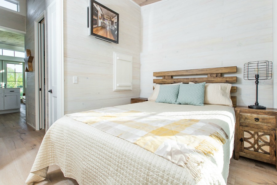 Tiny house beautiful! This saltbox style designer cottage by architect Jeffrey Dungan is offered at The Retreat by Oakstone.