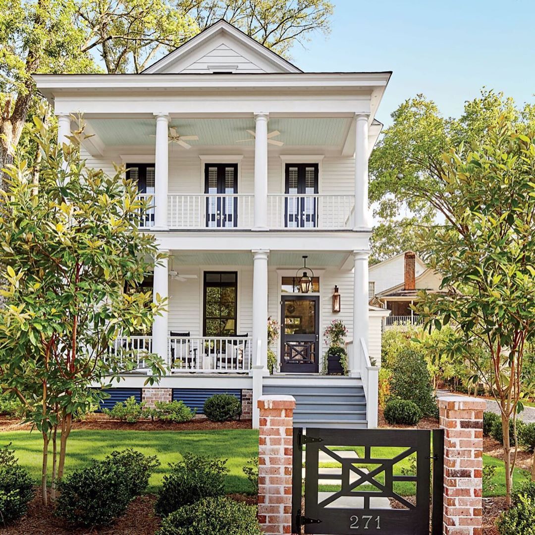 Gorgeous Southern plantation style home with front porches - Southern Living Magazine. Charming inspiration if you love white painted house exteriors! #whitehouses #housedesign #exteriors #designinspiration