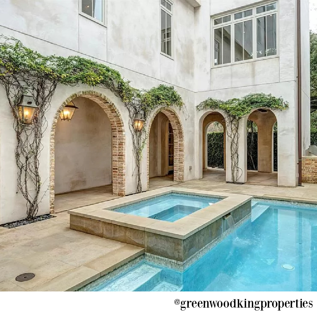 Pool and arches in modern French Houston Home (1119 Berthea St.) - @greenwoodkingproperties. #modernfrench #interiordesign #pools
