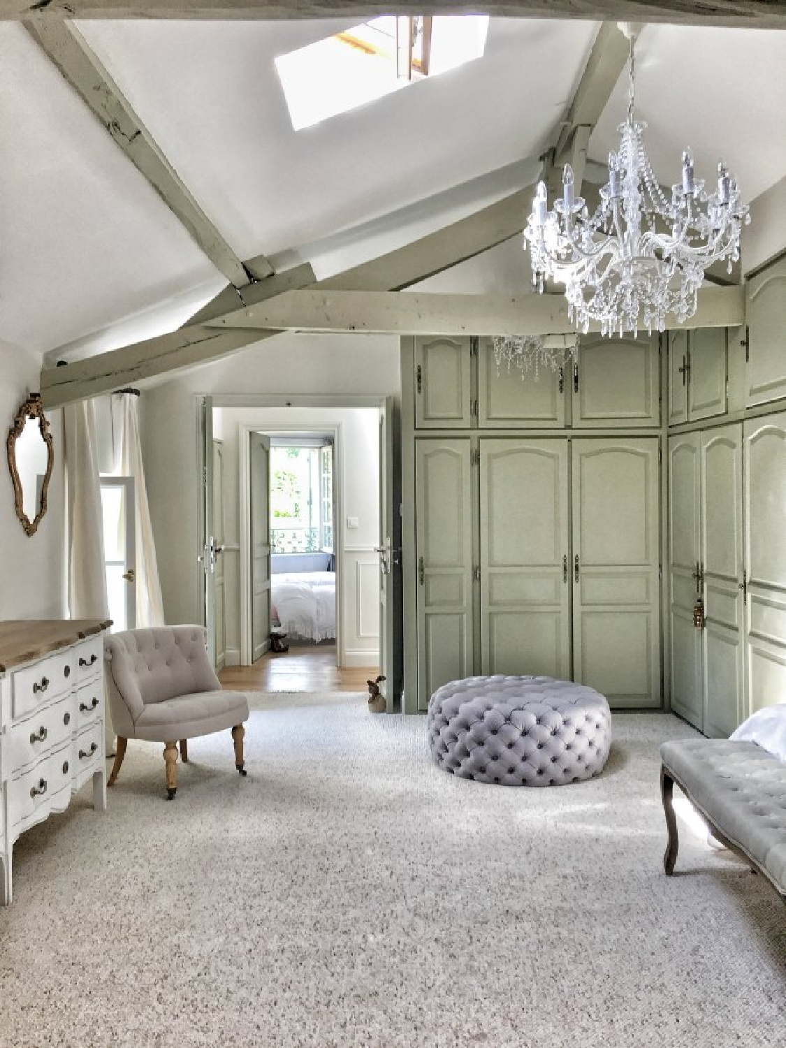 French Gray (Farrow & Ball) painted cabinets in a French farmhouse closet in a Bordeaux farmhouse in France by Charlotte Reiss of Vivi et Margot. 