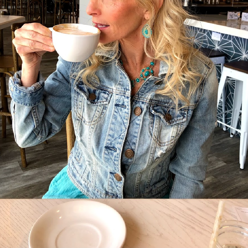 Michele of Hello Lovely in denim jacket sipping espresso at brunch at The Hampton Social in South Barrington. #hamptonsocial #thehamptonsocial