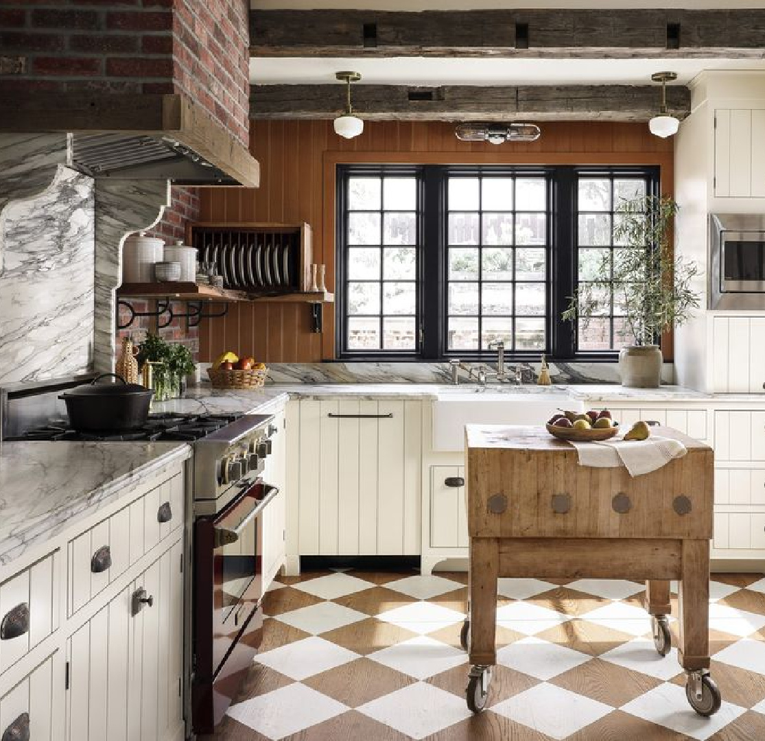 https://www.hellolovelystudio.com/wp-content/uploads/2023/01/benjamin-moore-light-breeze-on-cabinets-haris-kenjar-photo-landed-interiors-and-homes-kitchen-checkered-floor.jpg