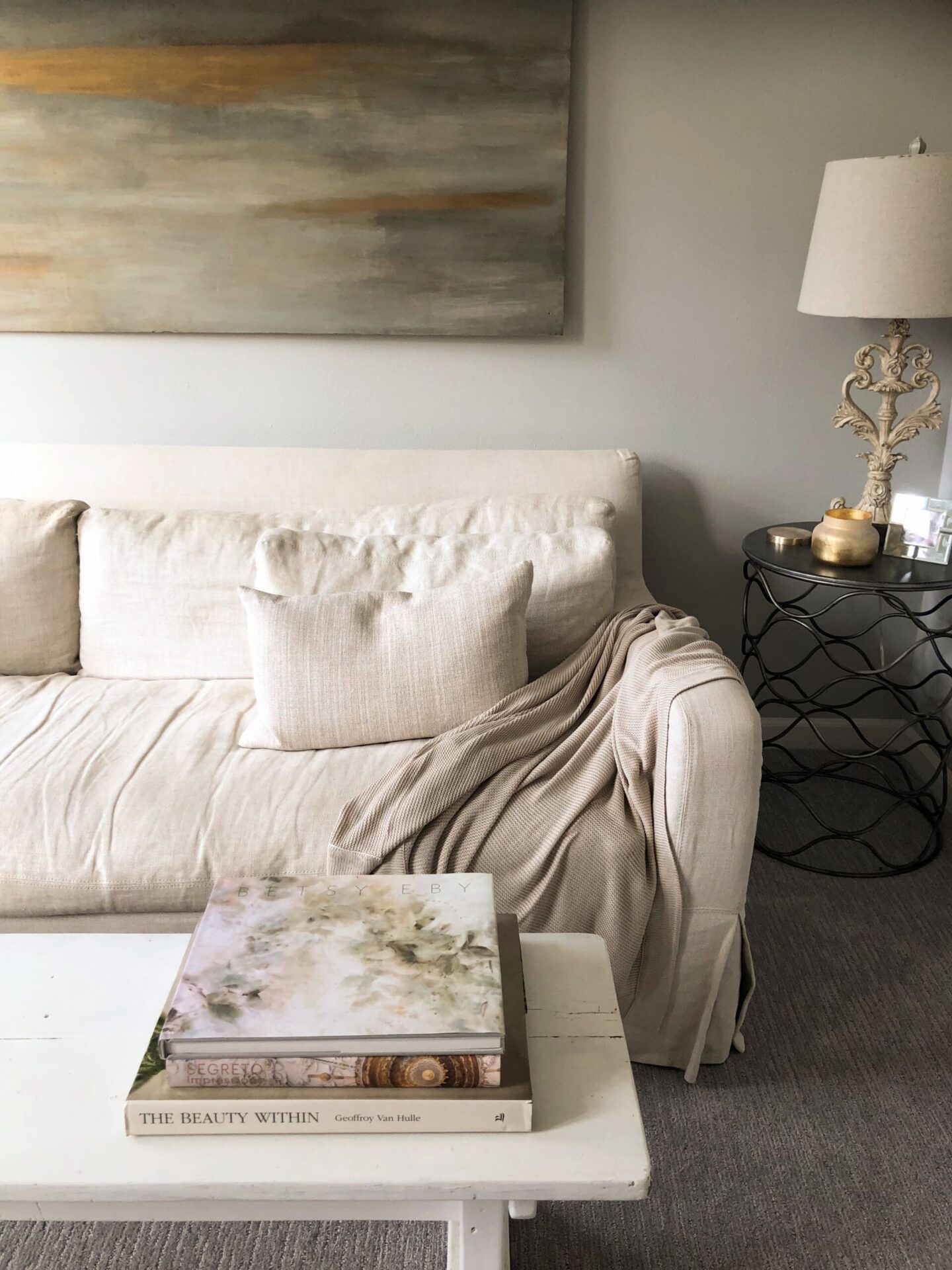 Cozy Earth Cloud Knit Blanket Throw (Driftwood) on my Belgian linen sofa. Walls are Sherwin Williams Repose Gray - Hello Lovely Studio. #cozyearth #cloudknitblanket #belgianlinen #belgianstyle #reposegray