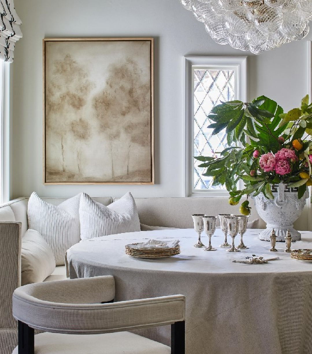 Neutral cozy opulent dining nook with banquette - @riverbrook_ #banquette #diningnook #sophisticatedinterior