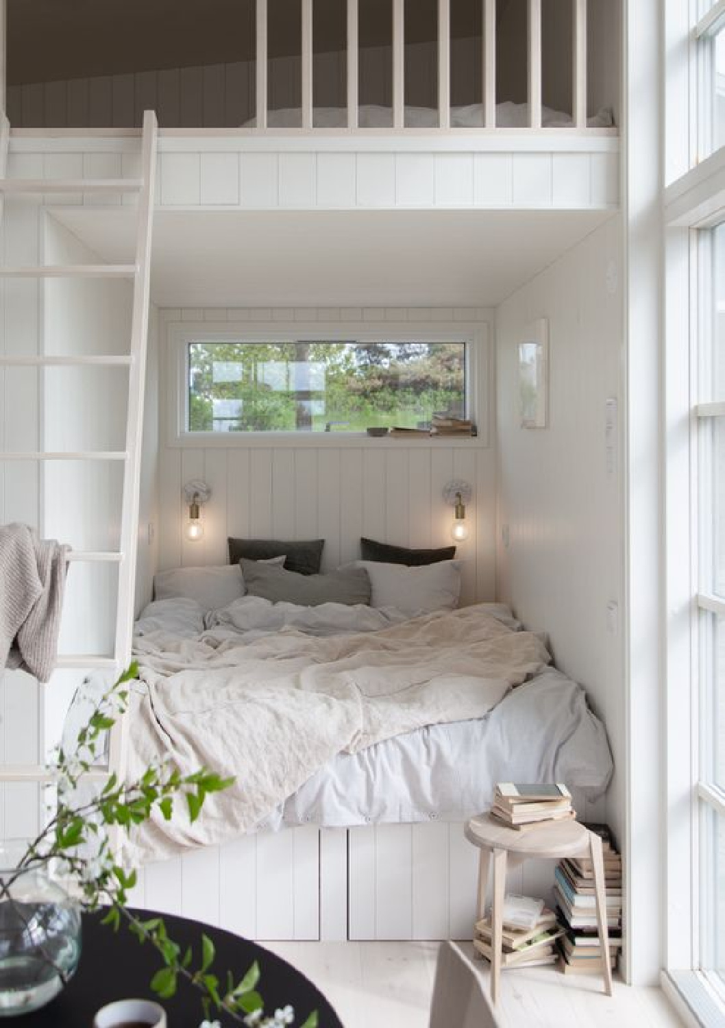 Sweet and cozy built in bunk area of a Scandi cabin with beaded board - My Scandinavian Home. #cozybedrooms #cozycabins #europeancottage #cozybedrooms #bunkrooms