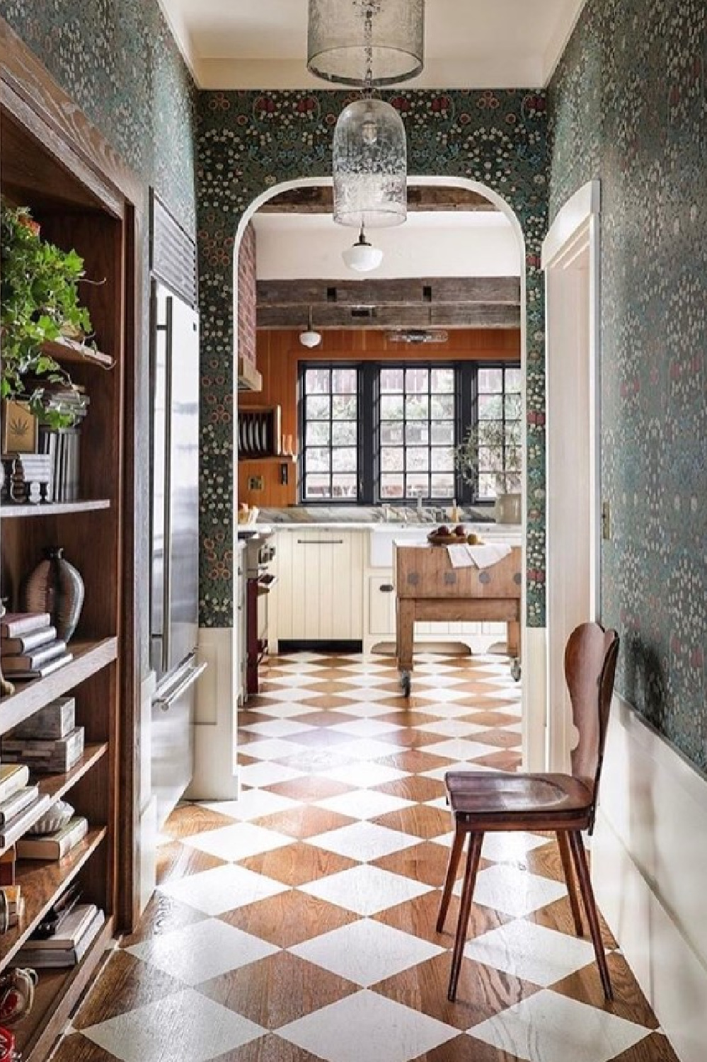 Kitchen and pantry area with charming checkered floor - @landedinteriors.