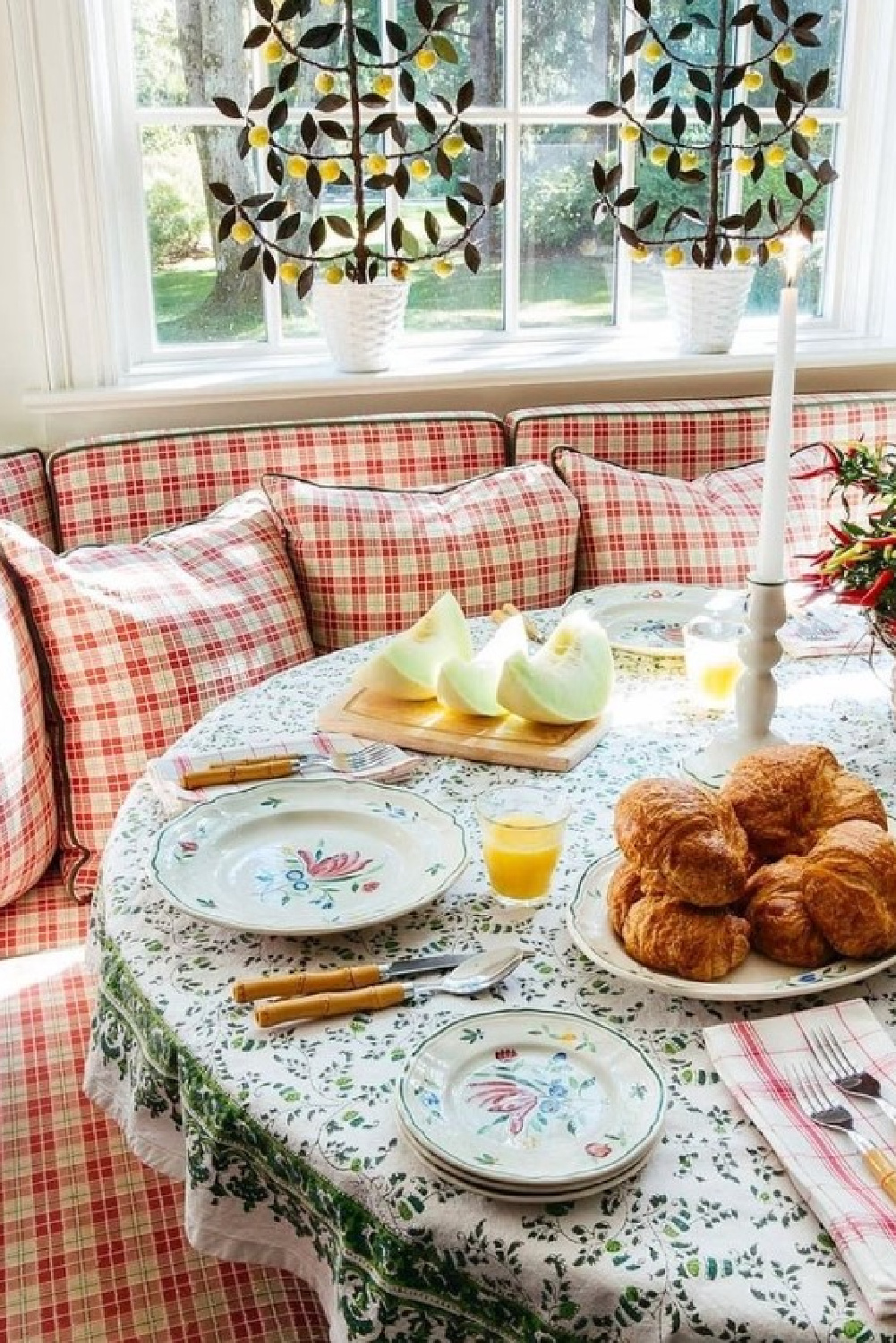 Check fabric on a banquette in breakfast nook - @libbycameronllc.