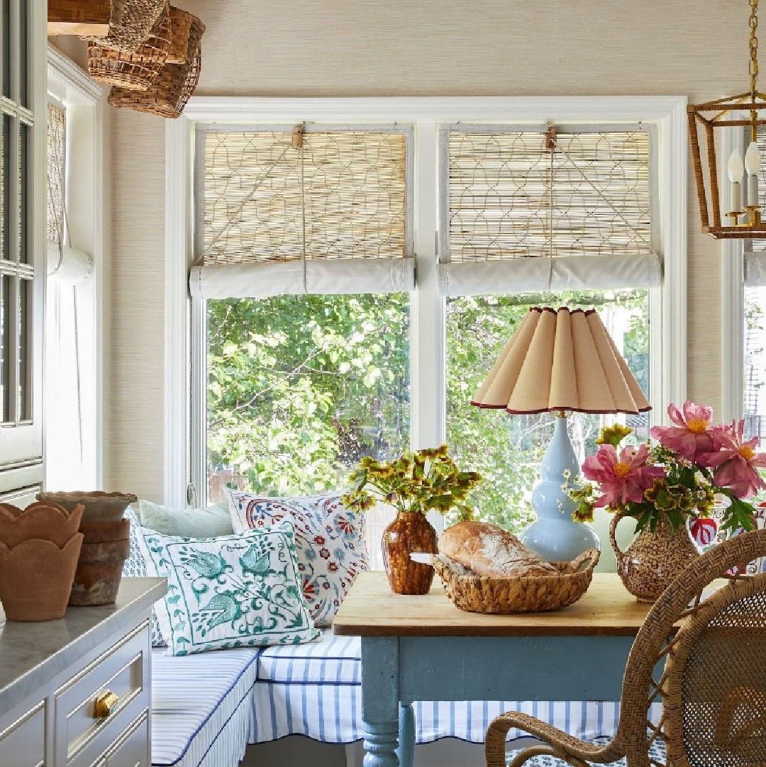 Beautiful modern vintage classic timeless kitchen with banquette, chick blinds, and vintage baskets. @stephperezstudio