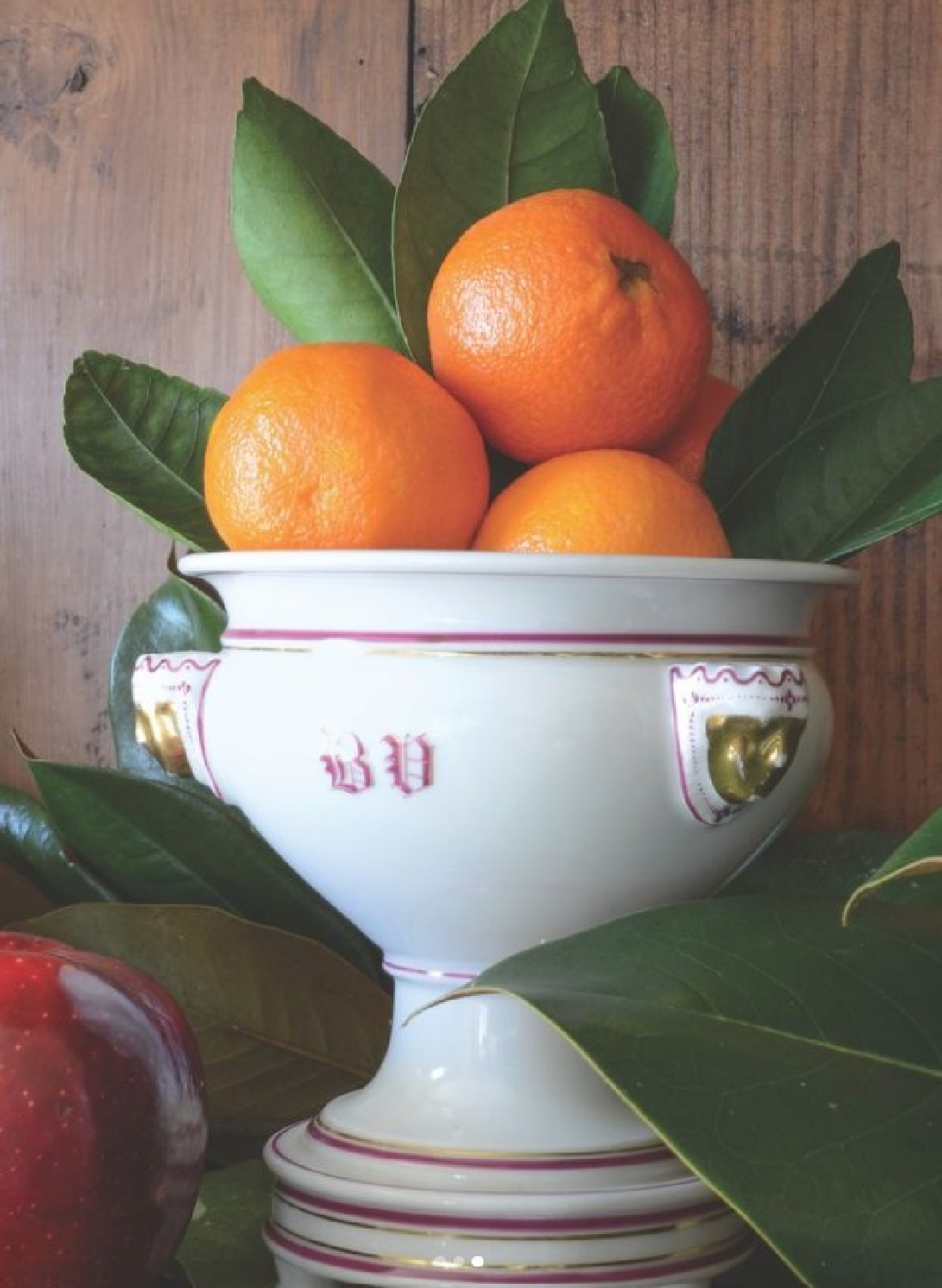 Citrus in a compote with magnolia leaves - @bvizdesign. #holidaydecor #holidaycitrus