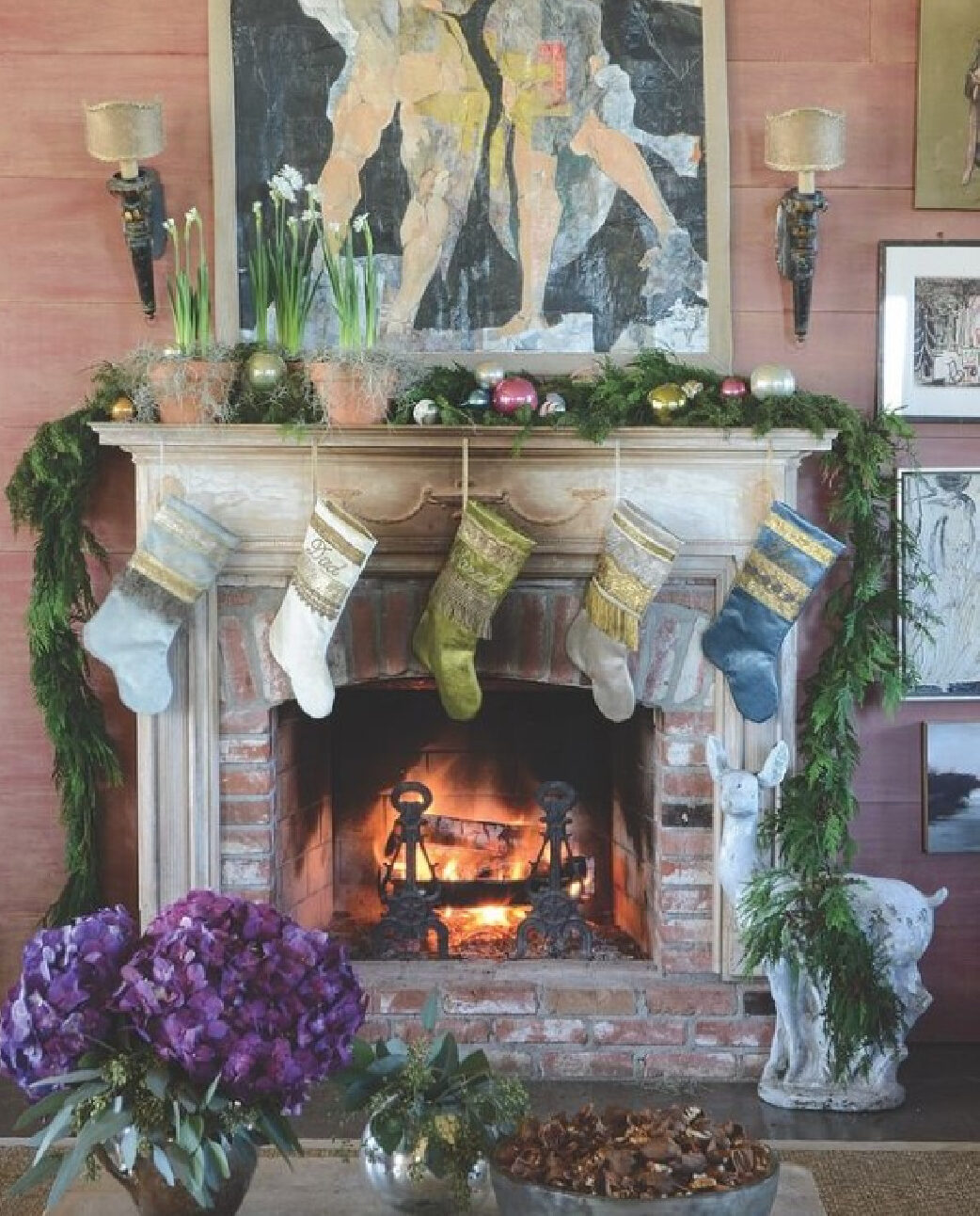 Rebecca Vizard's fireplace decorated with christmas stockings in her southern home (@bvizdesign). #southernchristmas #vbizdesign