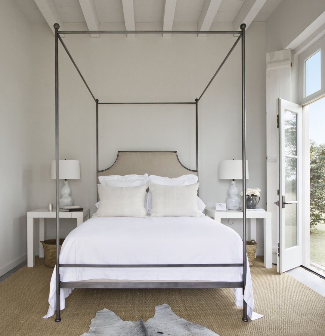 Bedroom in Eleanor Cummings designed modern French farmhouse near Round Top, TX in MILIEU magazine. #modernfrench #europeancountry