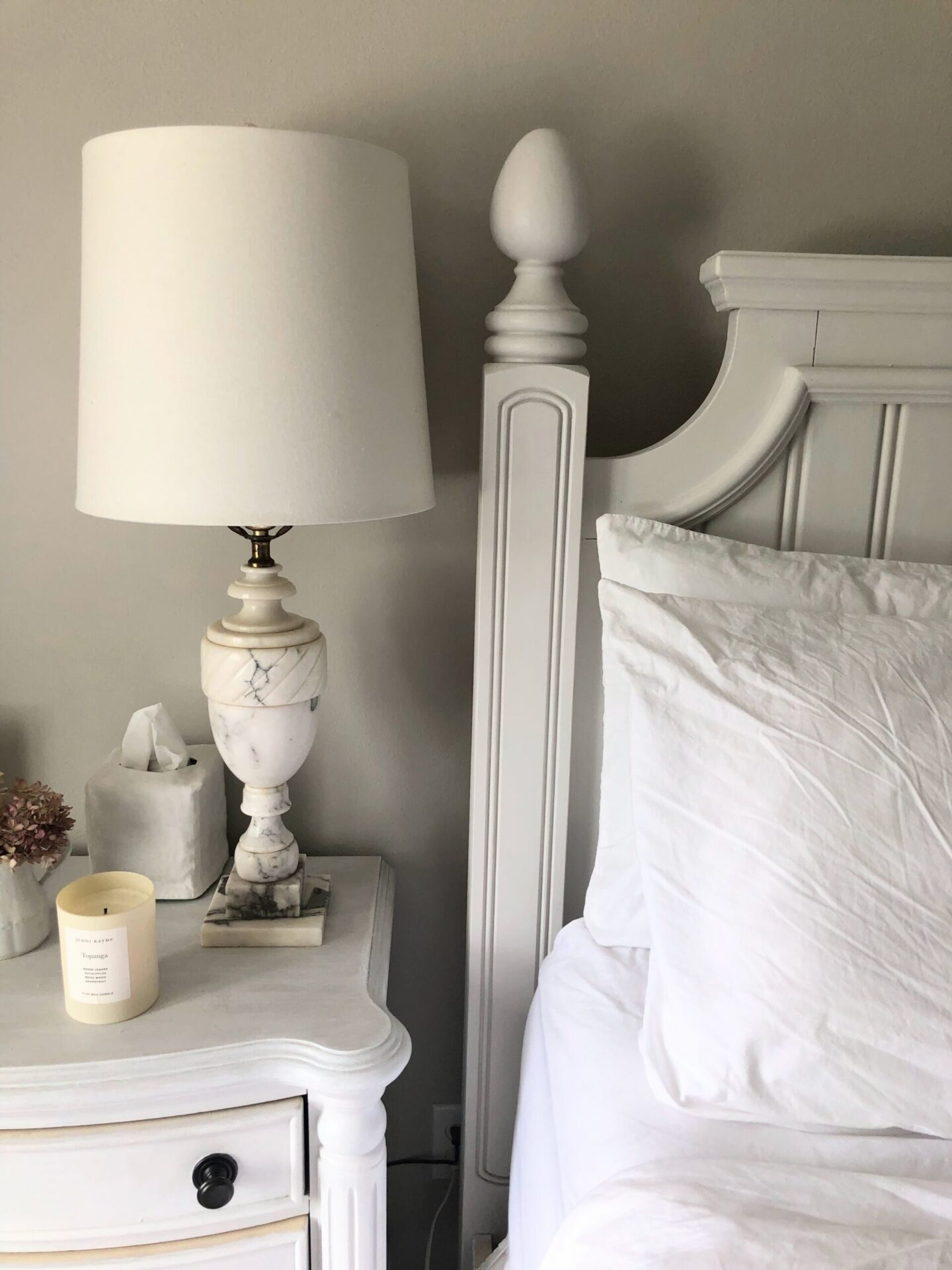 Organic cotton pillowcases (American Blossom Linens) on bed in our French country bedroom with vintage marble lamp and Topanga candle (Jenni Kayne) and SW Agreeable Gray walls. #sherwinwilliamsagreeablegray