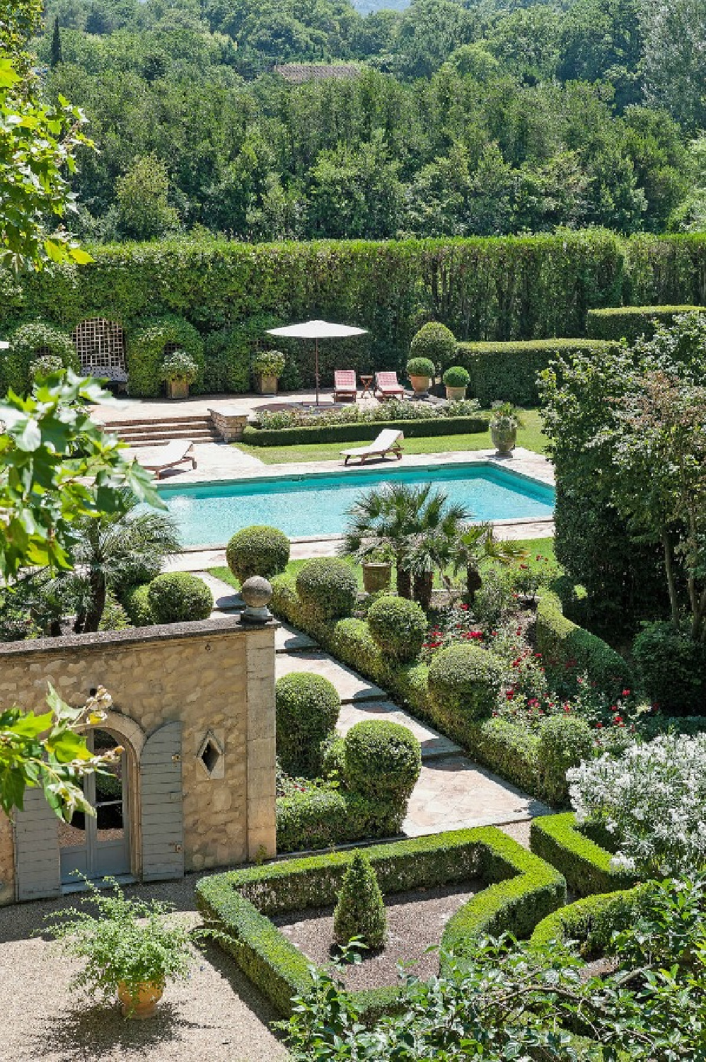 South of France manicured gardens and pool at Chateau Mireille in Provence - Haven In. #provencestyle #provencegarden