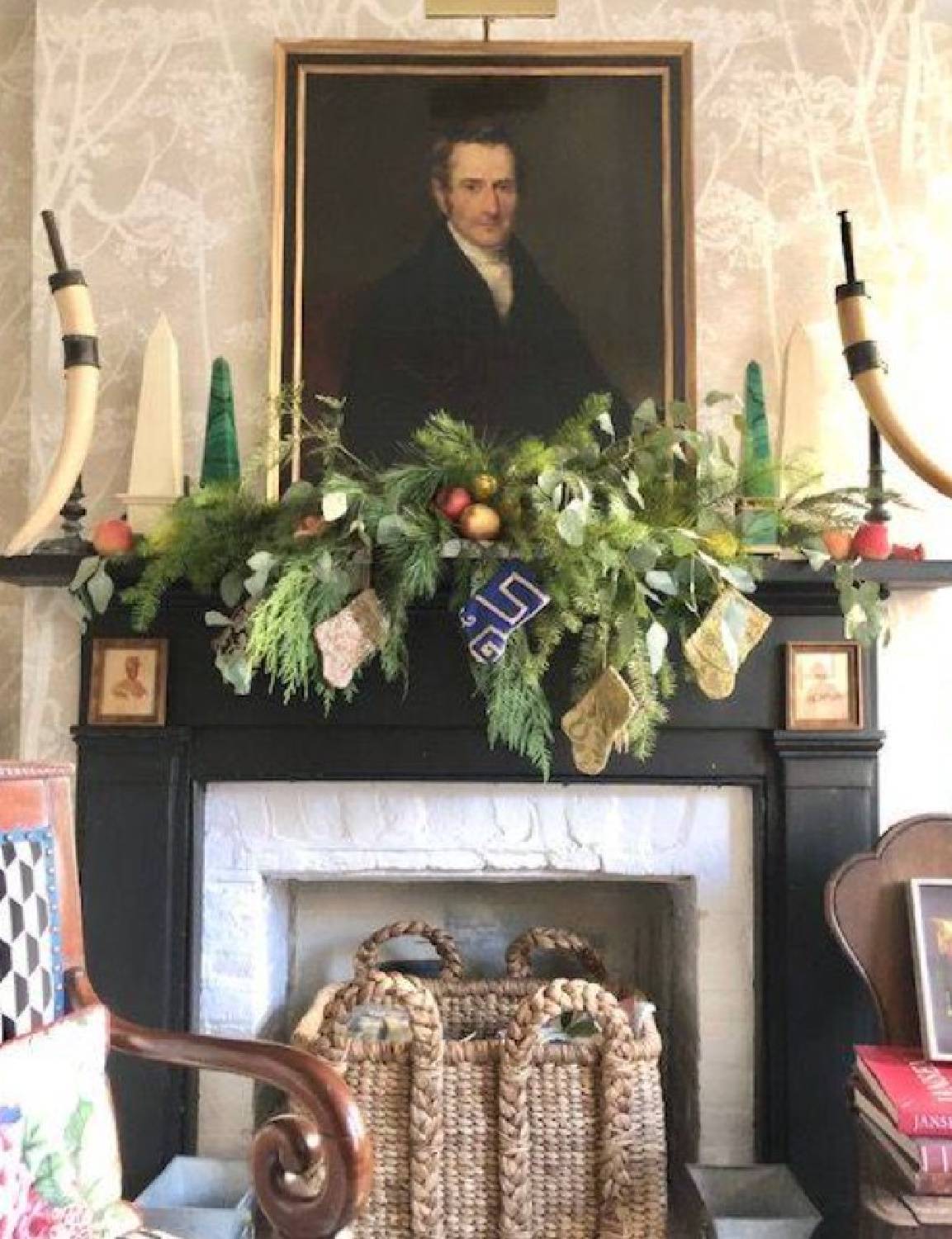 Holiday decor and stockings from VBIZ on a fireplace mantel with antique portrait - @keithecarrol. #holidaymantel #oldworldholiday