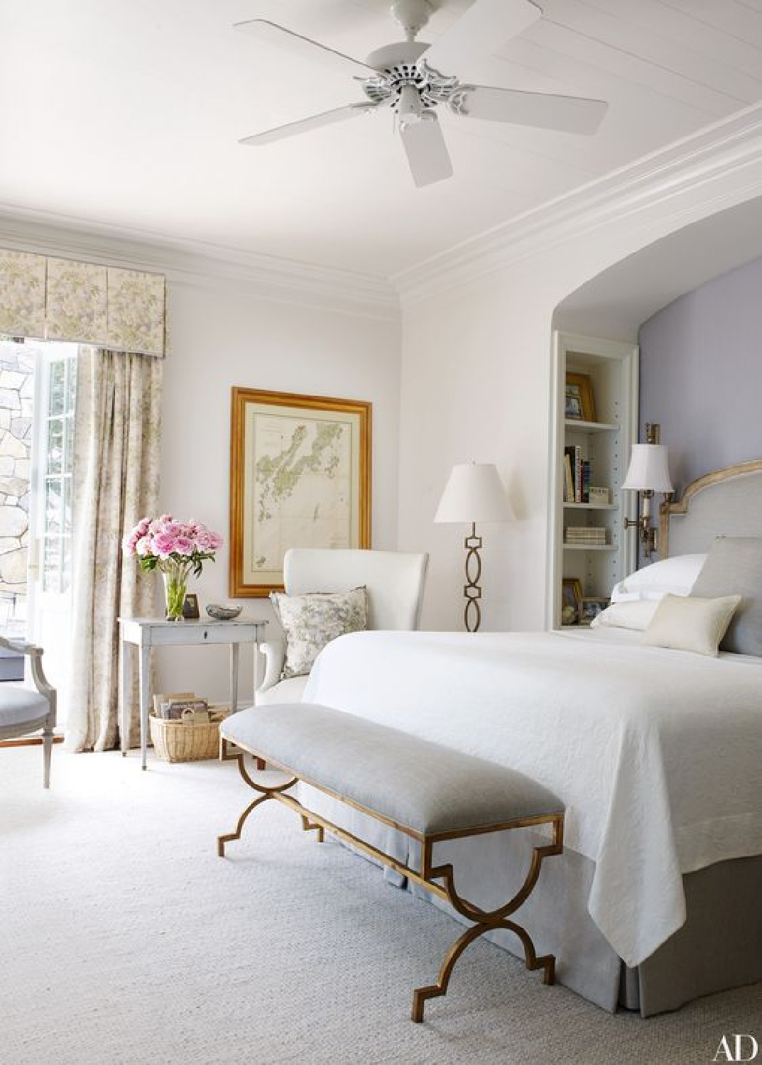 Suzanne Kasler and Les Cole designed bedroom with niche for bed painted blue. #suzannekasler