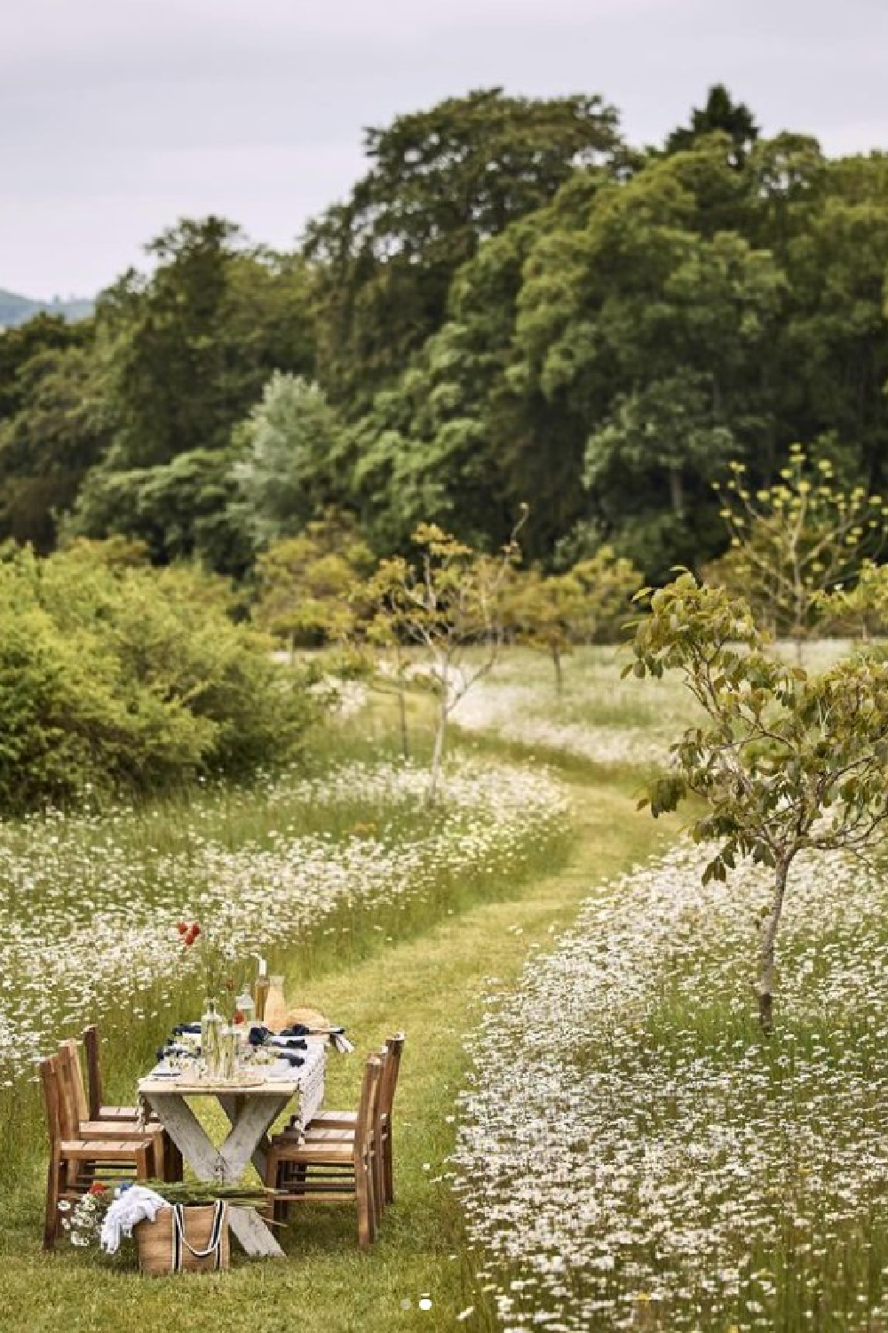 English countryside tablescape from Daylesford Living by Carole Bamford (Vendome, 2024) - photo by Martin Morrell.