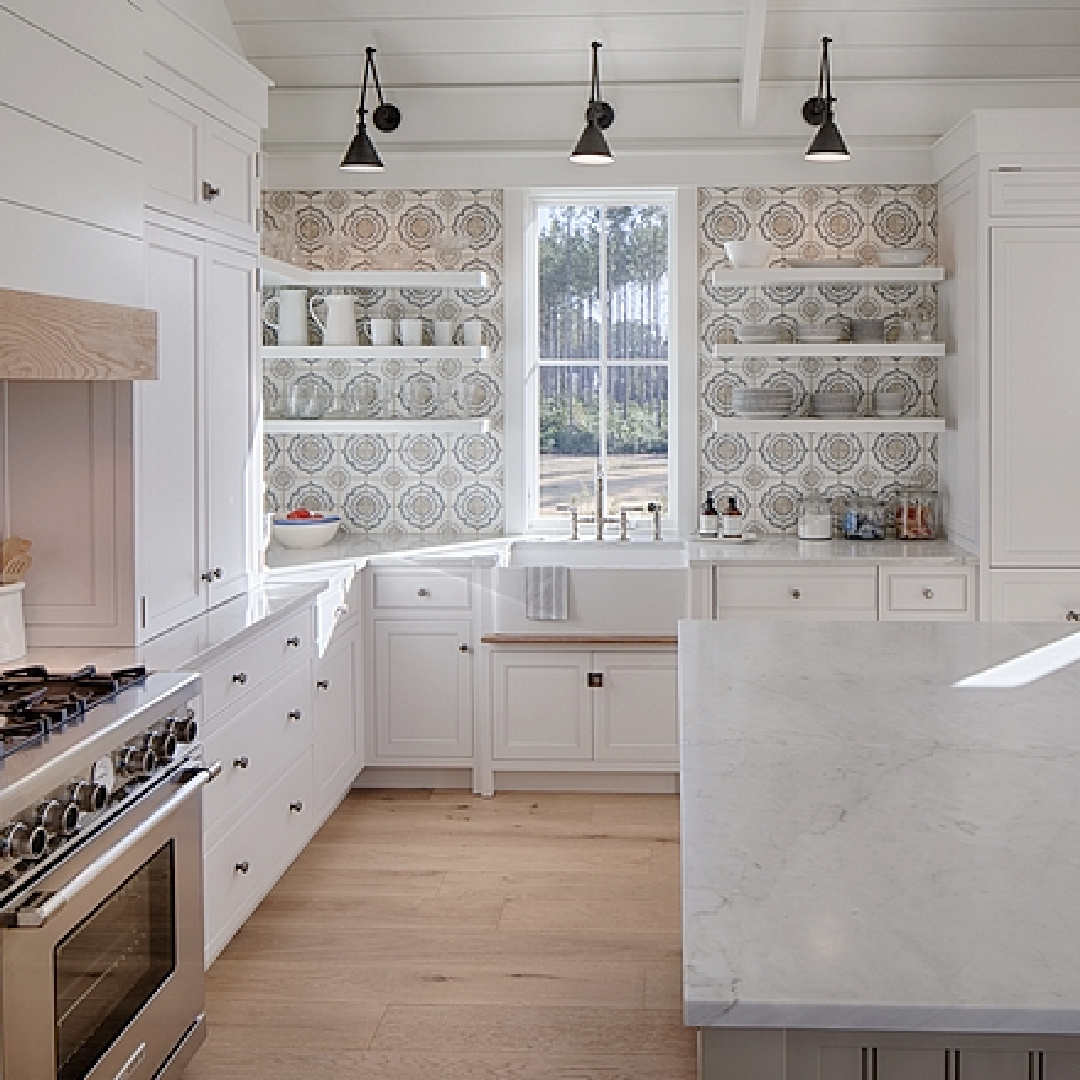 Modern farmhouse coastal white kitchen with floating shelves, cement tiles, and white oak flooring - Lisa Furey.