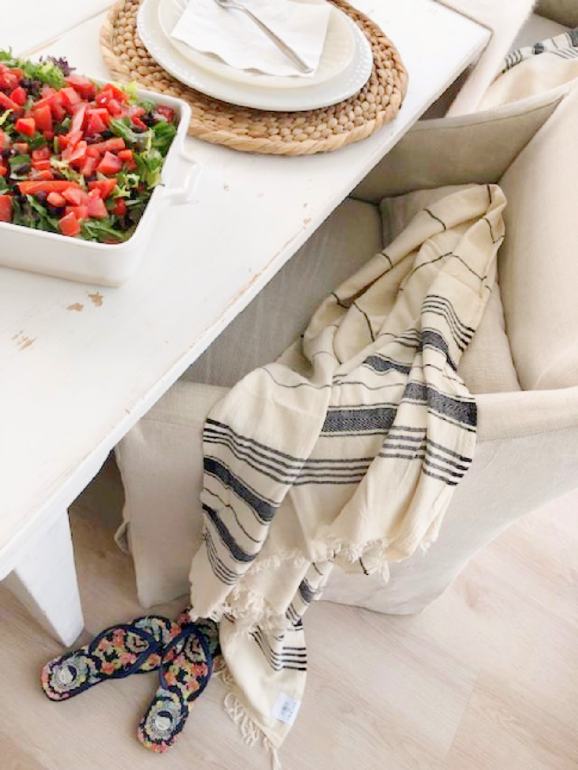 Turkish towel (Thriae) with charcoal stripes on my linen chair - Hello Lovely Studio. #turkishtowels