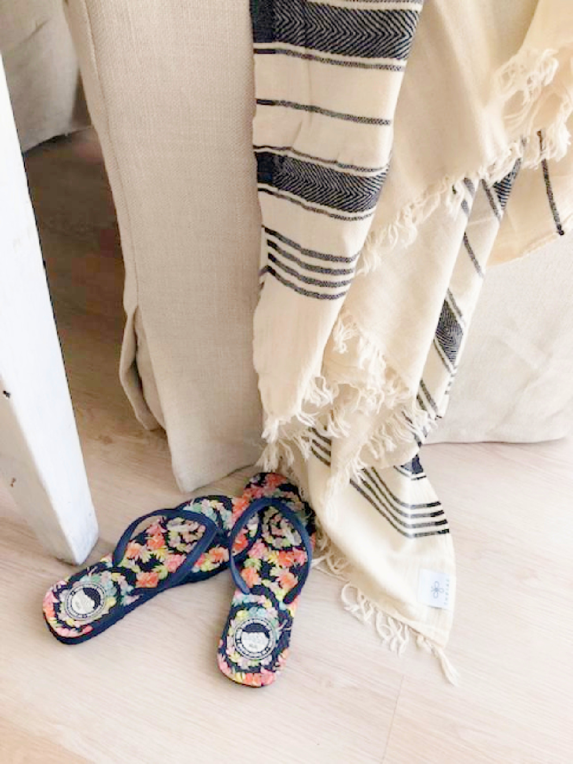 Turkish towel (Thriae) with charcoal stripes on my linen chair - Hello Lovely Studio. #turkishtowels