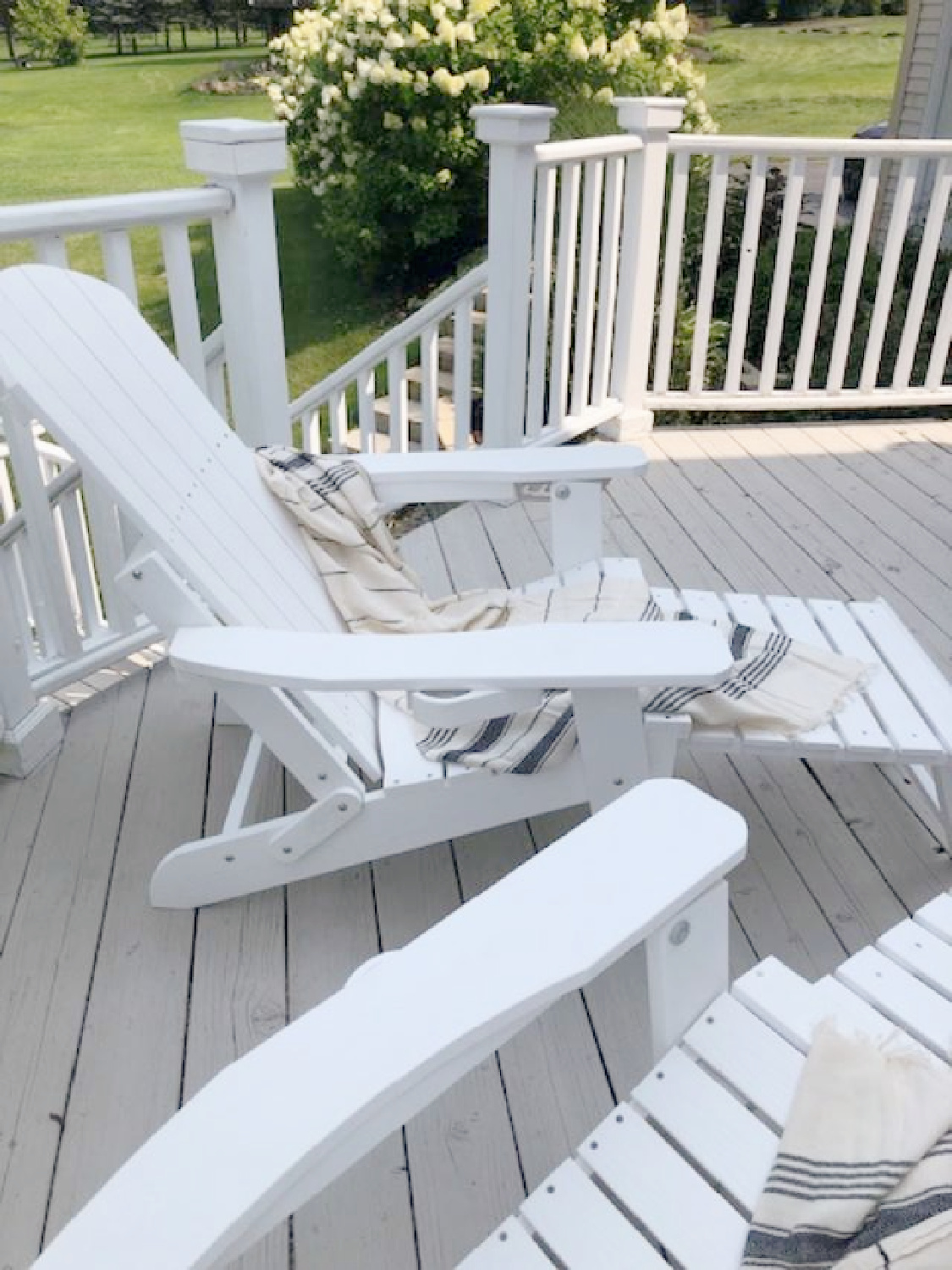 Turkish towel (Thriae) with charcoal stripes on my Adirondack chairs on deck - Hello Lovely Studio. #turkishtowels