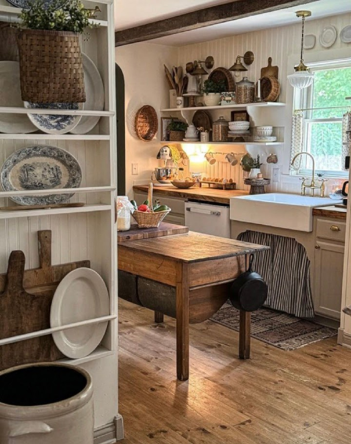 Cozy country kitchen with plate rack, open shelving and farm sink - @fitzgeraldlane