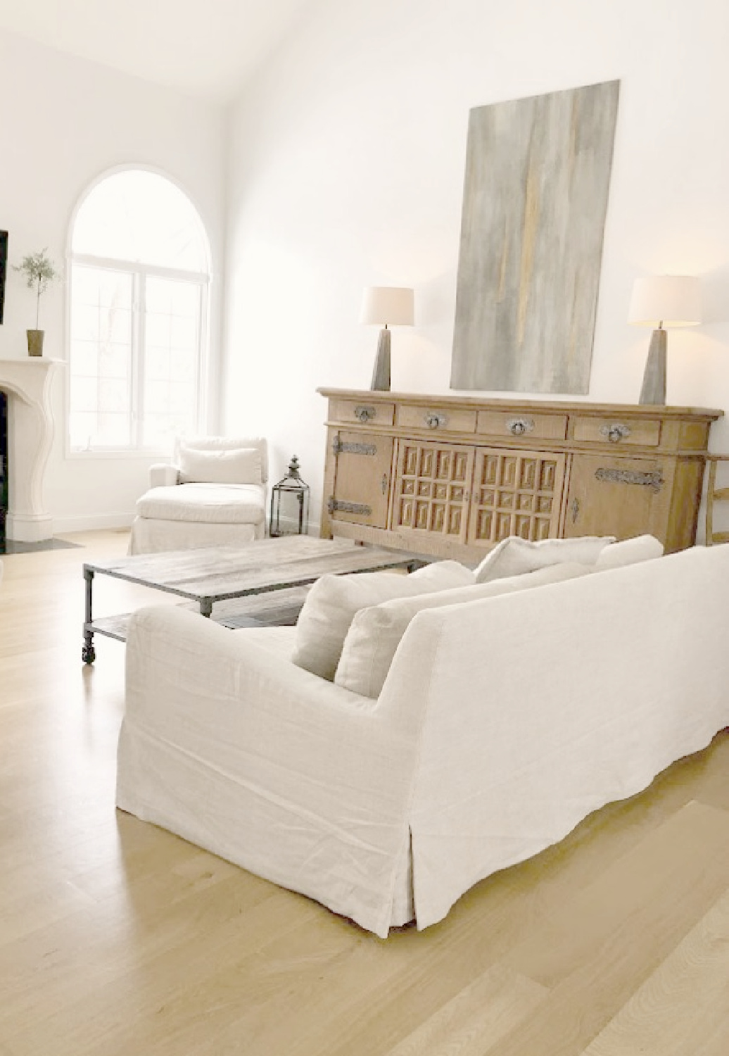 Belgian style minimal modern rustic living room with white oak hardwood floors - Hello Lovely Studio.