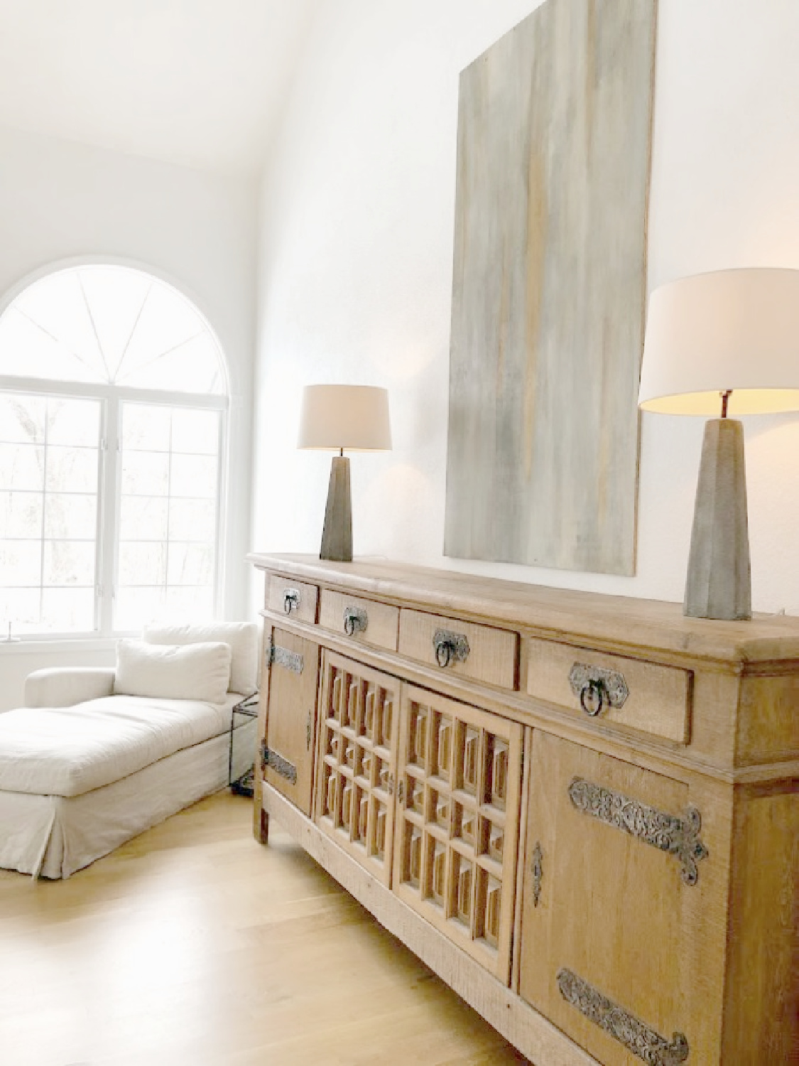 Belgian style minimal modern rustic living room with white oak hardwood floors - Hello Lovely Studio.