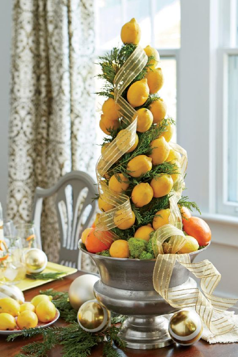 Festive lemon topiary for holiday decor - Southern Living. #topiaries #holidaydecor