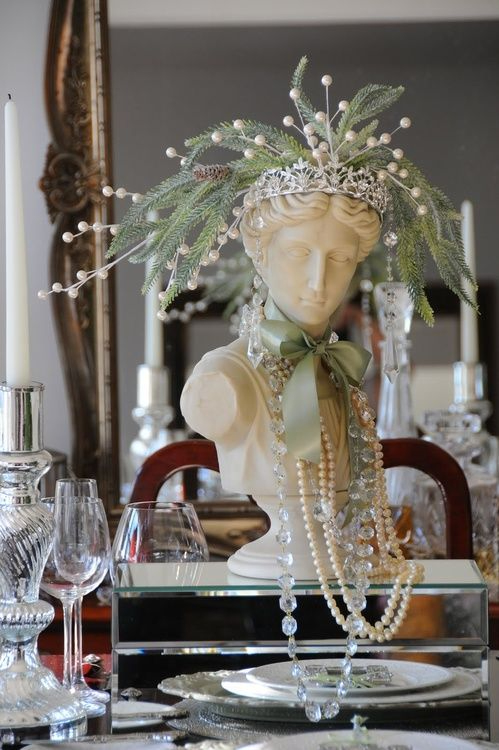 French country Christmas elegant bust with rhinestone tieara, crystal, and greenery decorated for a holiday table - Terssenta. #frenchchristmas