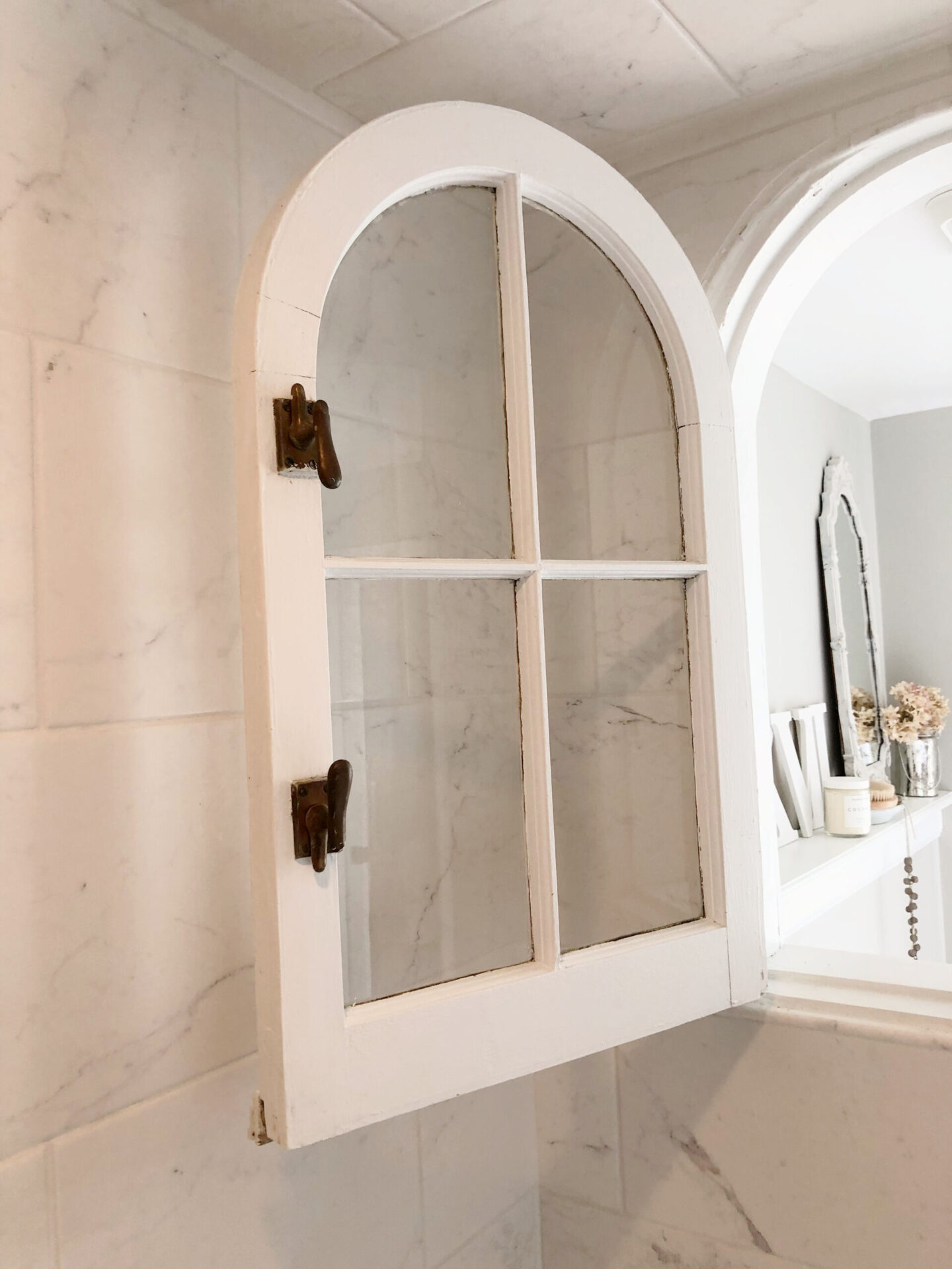 Hello Lovely's DIY renovated classic white bath with clawfoot tub and marble herringbone tile floor. Sherwin-Williams Repose Gray on walls. #sherwinwilliamsreposegray