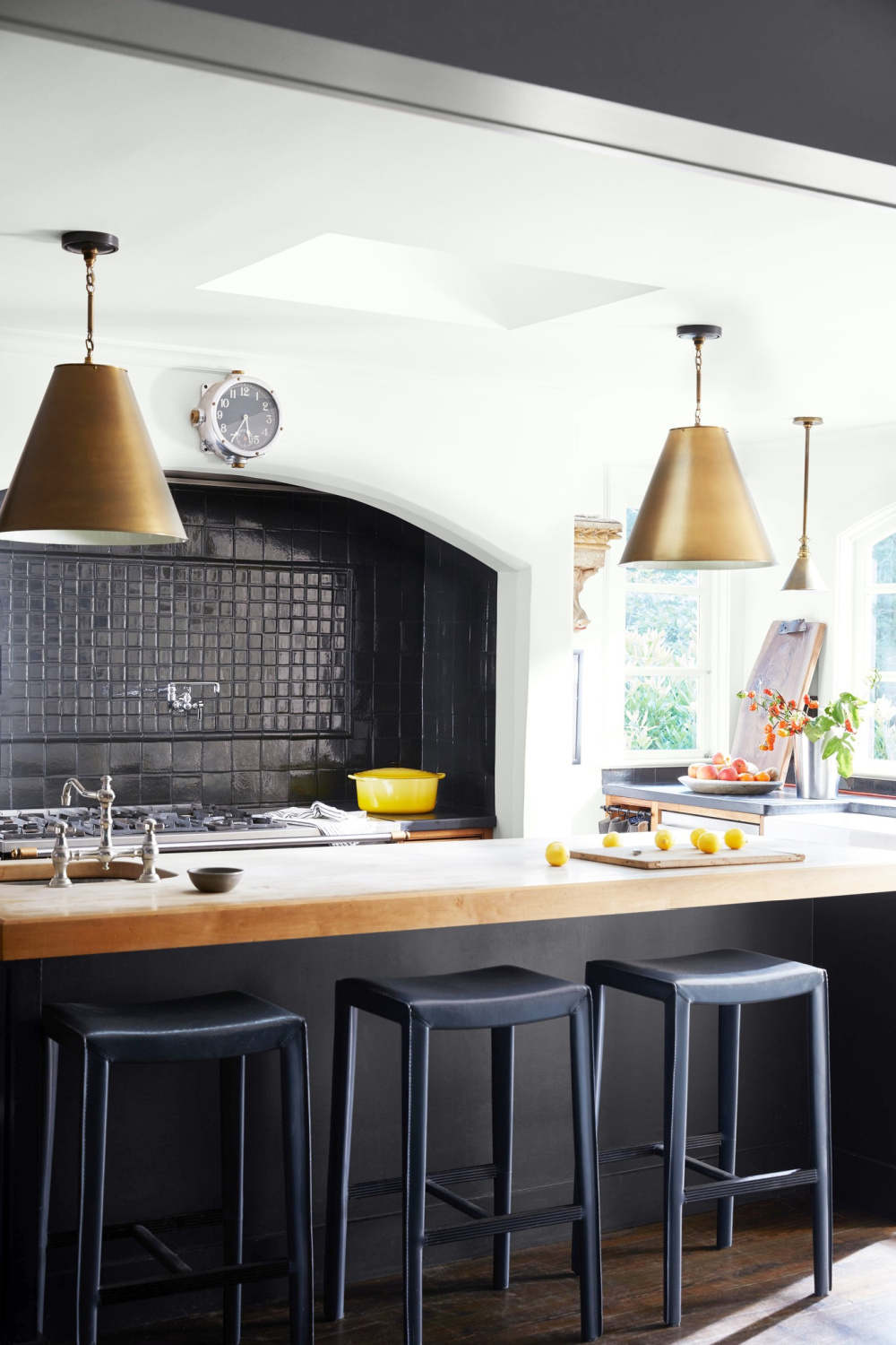 Chantilly Lace in a kitchen with black and gold accents - Benjamin Moore. #chantillylace #whitepaintcolors