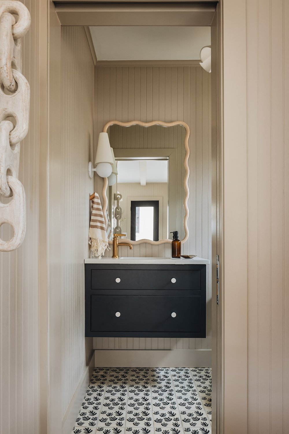 Kate Marker Interiors designed bespoke bathroom with floating vanity.