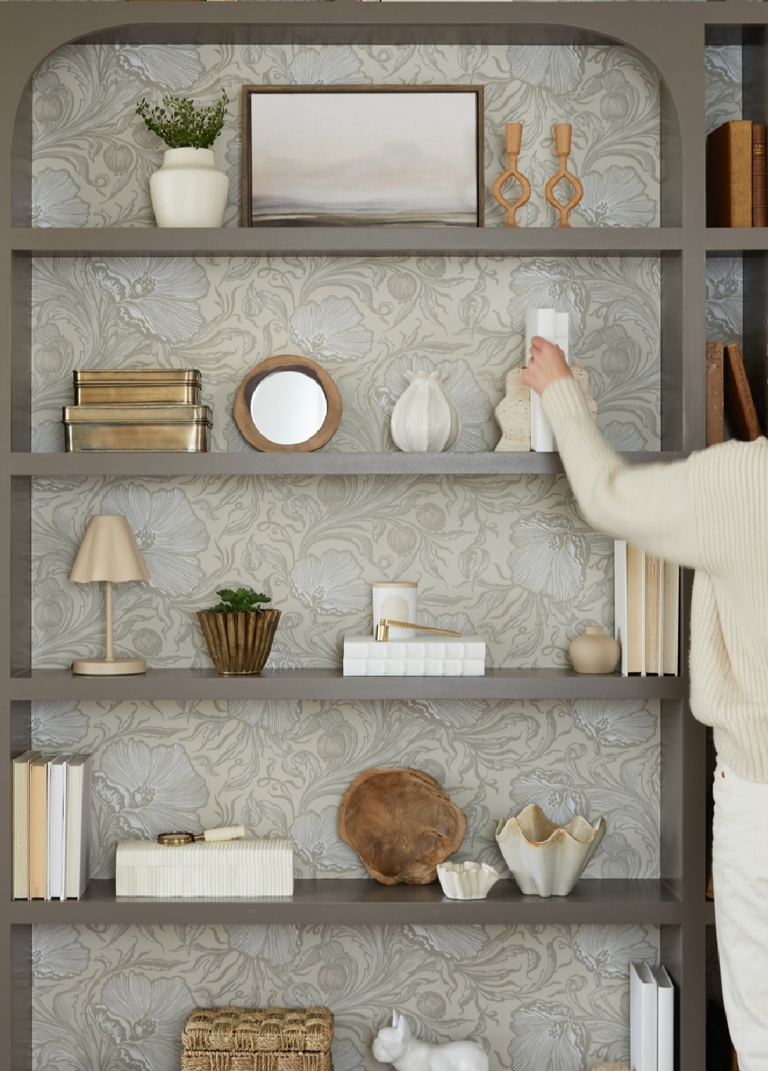 Kate Marker Interiors designed charming built-in shelves with decor and wallpaper wallpaper - photo @kevinpenczak.