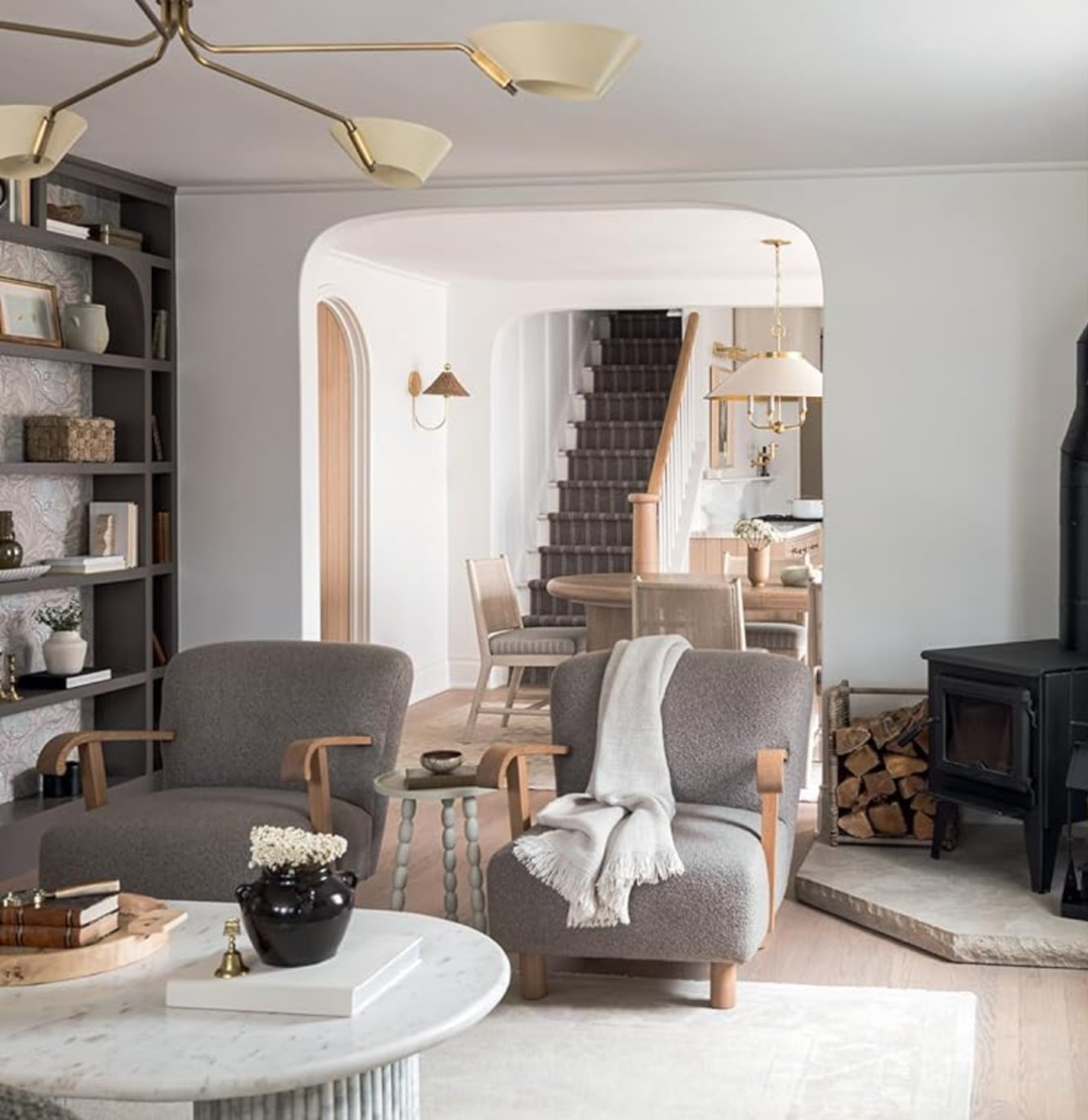 Modern lighting and traditional archway. Lovely, light, modern traditional design from Kate Marker and THE LOVE OF HOME (Gibbs Smith, 2024). #katemarkerinteriors