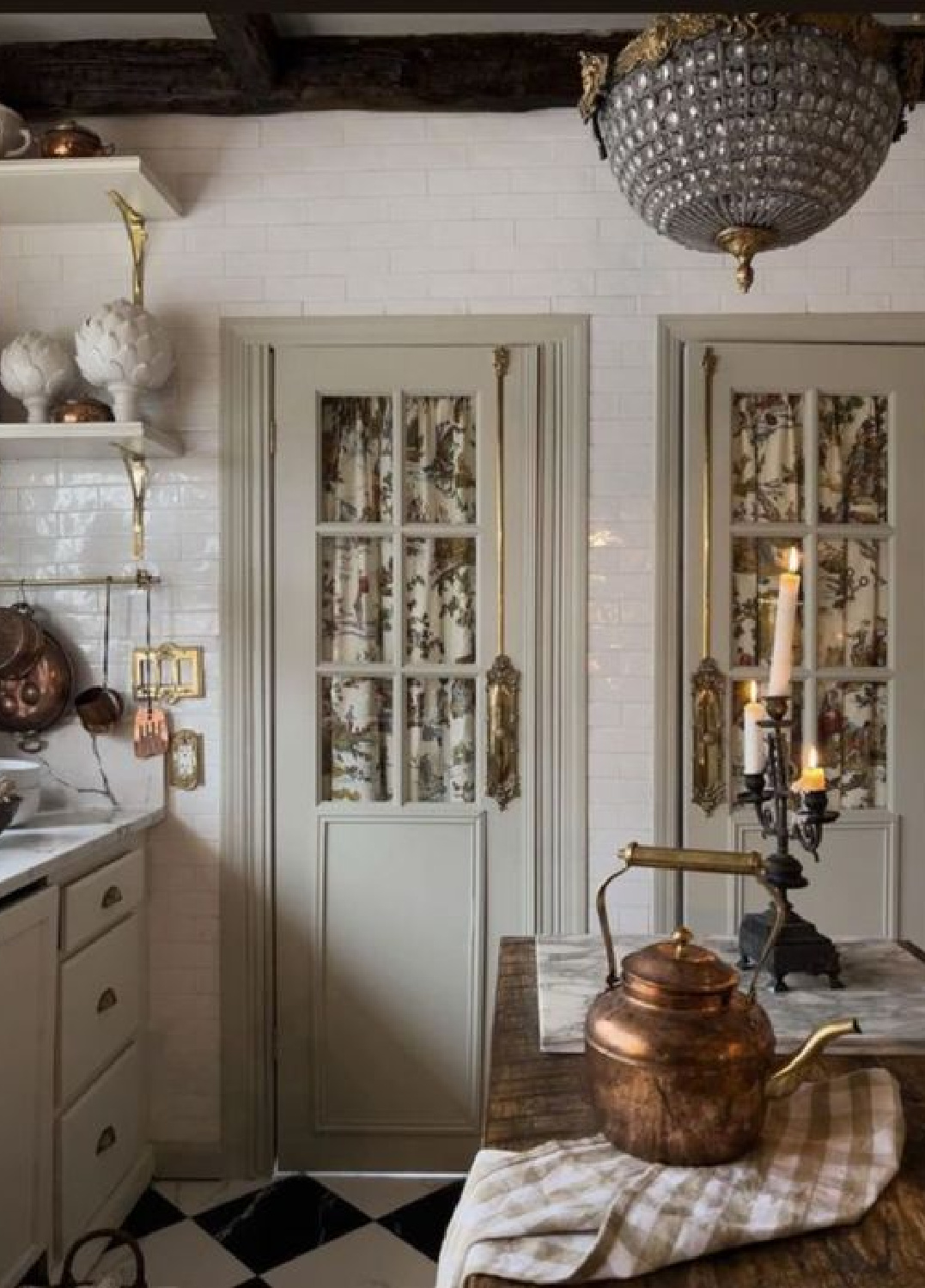 PaigeContrafouris - charming vintage kitchen with sage green doors and glossy subway tile. #vintagekitchen