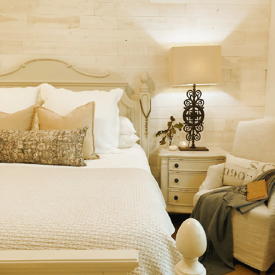 Hello Lovely's serene bedroom with Stikwood (Hamptons White) statement wall and Montara pillow (Amber Lewis + Loloi). #hellolovely #fallbedrooms