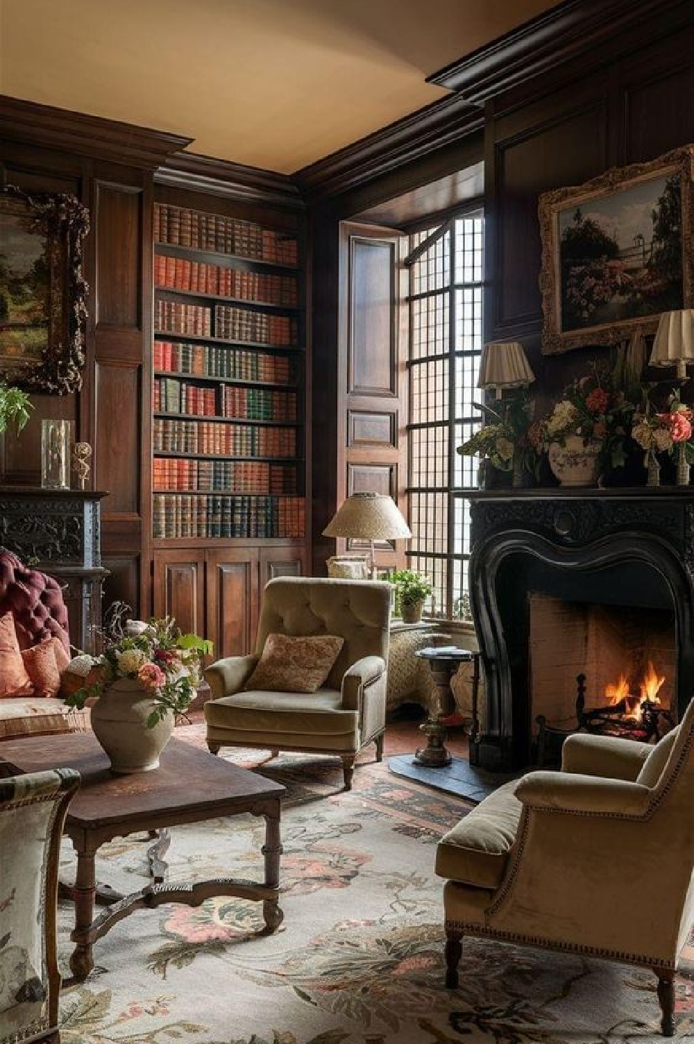 Ai designed image of dark academia aesthetic with cozy fireplace in study with books and moody style via @carolruchalski7. #darkacademia #aidesign