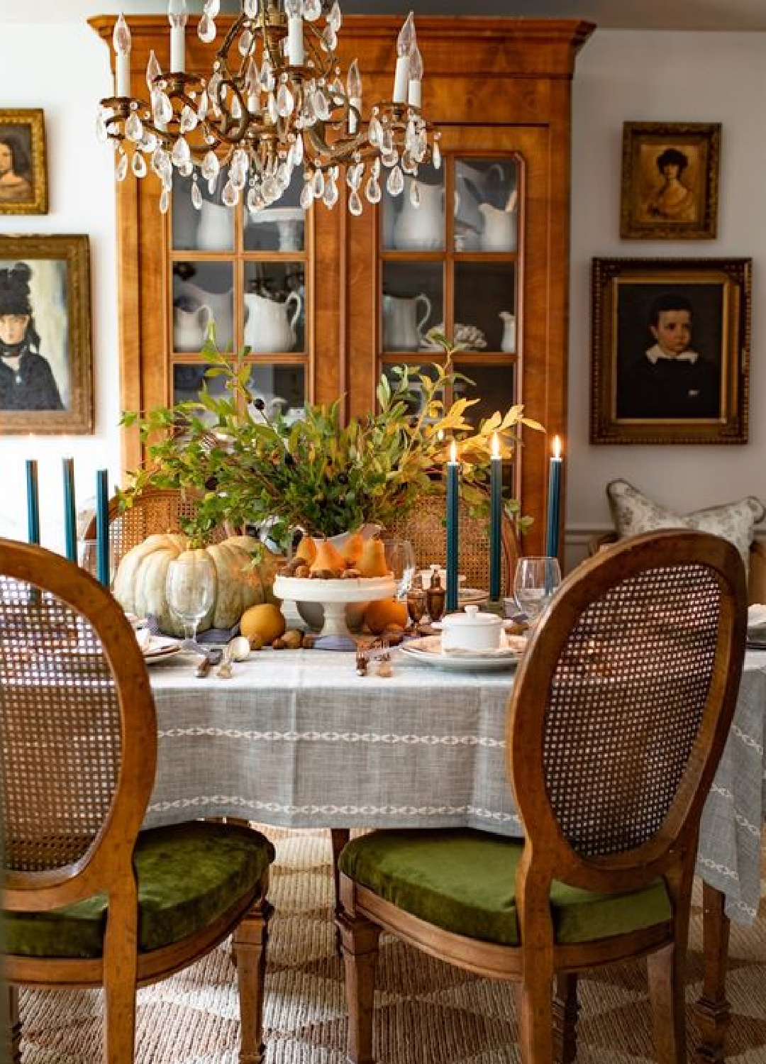 Lovely country Fall tablescape in dining room with Louis style cane back chairs - Miss Mustard Seed. #falldiningroom #falltablescape