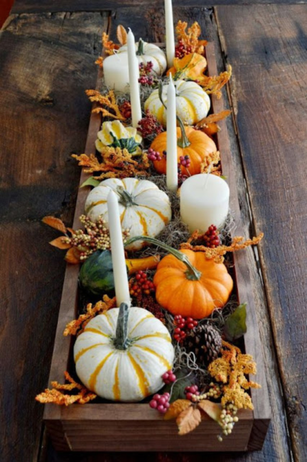 Rustic Fall tablescape with pumpkins and candles - Rosemary & Thyme. #falltablescape #falltabledecor