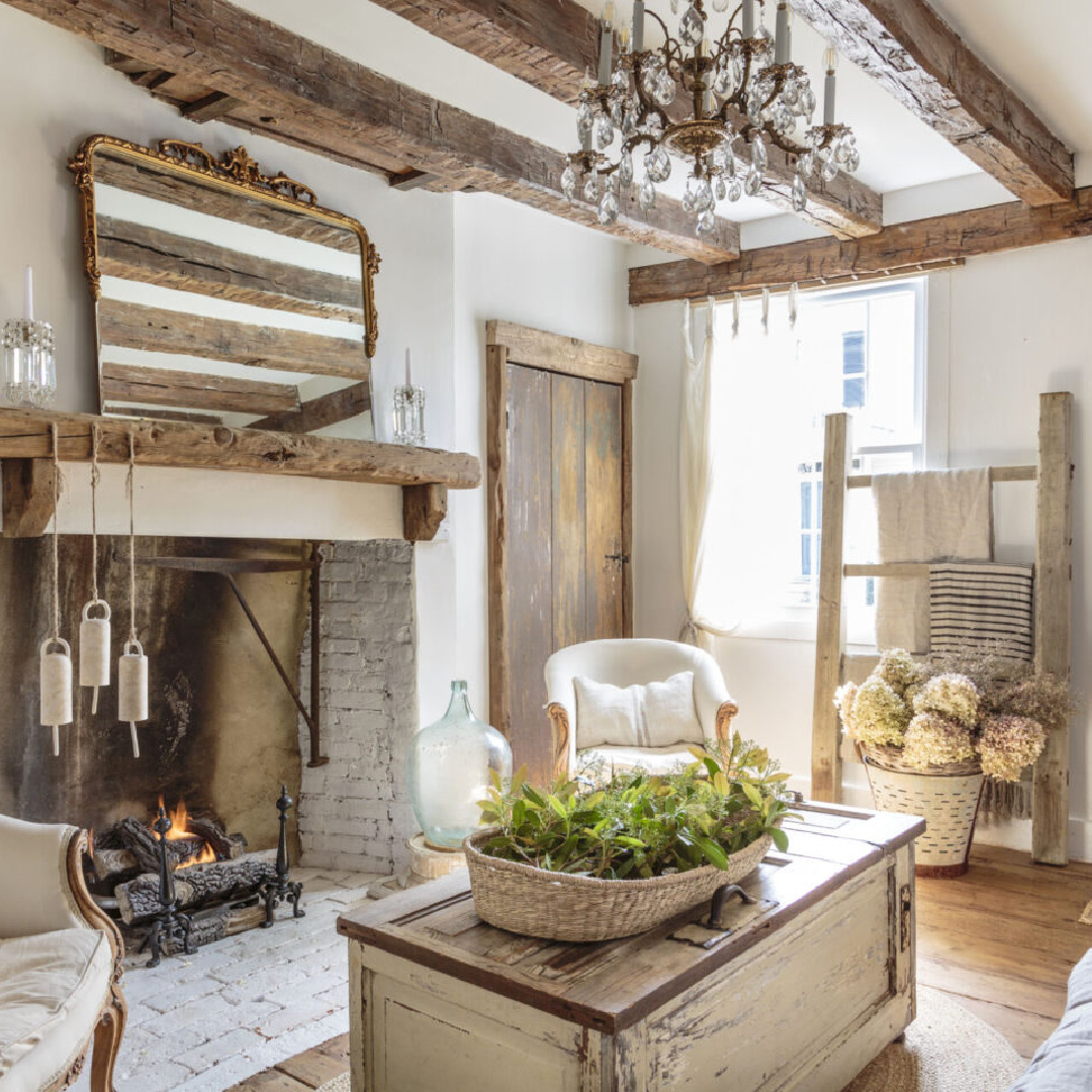 Rustic white country living room with wood beams in Fifi O'Neill's SHADES OF WHITE. #allwhitedecor #rusticcountry