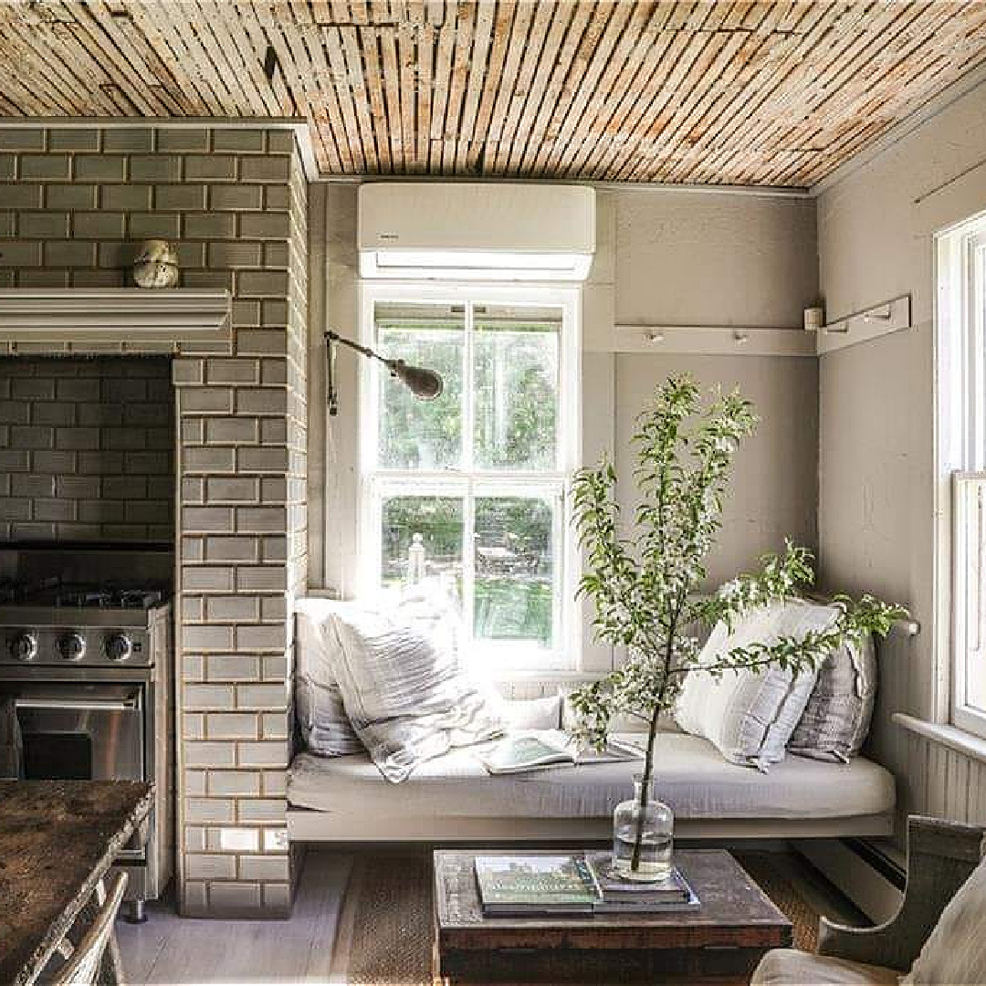 Kitchen window seat in rustic farmhouse in New York in its undone, rustic, charming, tumbledown lovely weathered wabi sabi state. #americanfarmhouse #countryhouses #newyorkfarmhouse