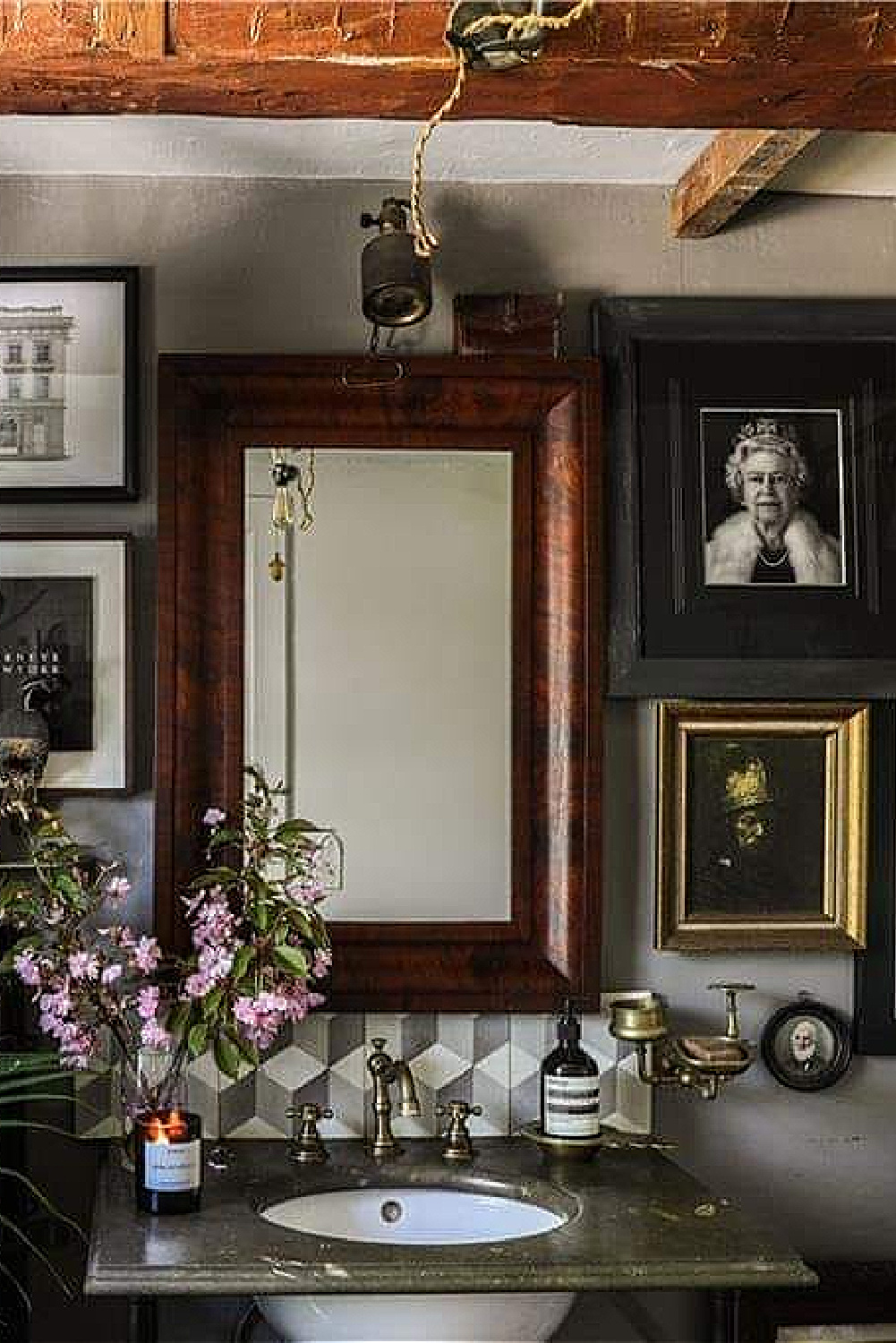 Bathroom with gallery wall in rustic farmhouse in New York in its undone, rustic, charming, tumbledown lovely weathered wabi sabi state. #americanfarmhouse #countryhouses #newyorkfarmhouse